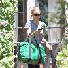 Amanda Seyfried carrying a green gym bag while leaving a friend's house in West Hollywood Los Angeles.