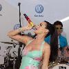 Katy Perry performs at the world premiere of the 2011 Volkswagen New Compact Sedan in Times Square New York City.