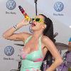 Katy Perry performs at the world premiere of the 2011 Volkswagen New Compact Sedan in Times Square New York City.