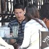 'Twilight' star Alex Meraz having a conversation with friends at Urth Cafe on Melrose Avenue Los Angeles.