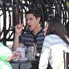 'Twilight' star Alex Meraz having a conversation with friends at Urth Cafe on Melrose Avenue Los Angeles.