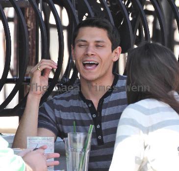 'Twilight' star Alex Meraz having a conversation with friends at Urth Cafe on Melrose Avenue Los Angeles.