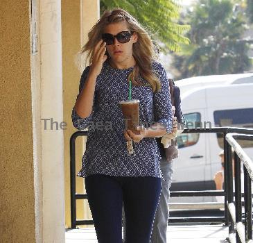 'Cougar Town' star Busy Philipps stops by Starbucks to get a large iced coffee Los Angeles.