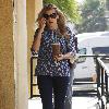 'Cougar Town' star Busy Philipps stops by Starbucks to get a large iced coffee Los Angeles.