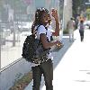 English  television presenter June Sarpong, wearing leather leggings, out and about in West Hollywood Los Angeles.