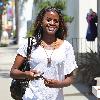 English  television presenter June Sarpong, wearing leather leggings, out and about in West Hollywood Los Angeles.