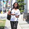 English  television presenter June Sarpong, wearing leather leggings, out and about in West Hollywood Los Angeles.