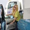 Mischa Barton stops at a gas station and buys cigarettes from a convenience store in West Hollywood Los Angeles.