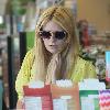 Mischa Barton stops at a gas station and buys cigarettes from a convenience store in West Hollywood Los Angeles.