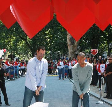 New York Mets pitcher Mike Pelfrey and New York Yankees shortstop Derek Jeter open 'The Delta Dugout' at Madison Square Park New York City.