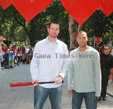 New York Mets pitcher Mike Pelfrey and New York Yankees shortstop Derek Jeter open 'The Delta Dugout' at Madison Square Park New York City.