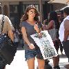 Jamie-Lynn Sigler, wearing cutoff denim shorts, shopping at Barnes & Noble at the Grove Los Angeles.