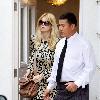 Claudia Schiffer leaving home to head for Luton airport London.