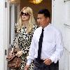 Claudia Schiffer leaving home to head for Luton airport London.