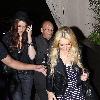 Lindsay Lohan leaving Teddy's nightclub in Hollywood, wearing a striped dress and leather jacket. Los Angeles, California.