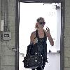 Gisele Bundchen walking through a parking garage after leaving her gym in Studio City Los Angeles.