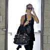 Gisele Bundchen walking through a parking garage after leaving her gym in Studio City Los Angeles.