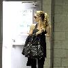 Gisele Bundchen walking through a parking garage after leaving her gym in Studio City Los Angeles.