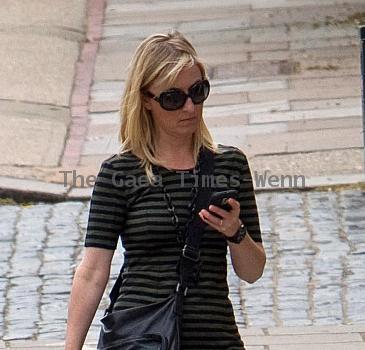 Fiona Phillips on her way to collect her boys from school. London.