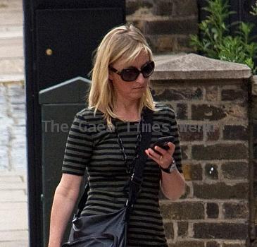 Fiona Phillips on her way to collect her boys from school. London.