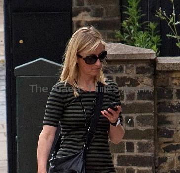 Fiona Phillips on her way to collect her boys from school. London.