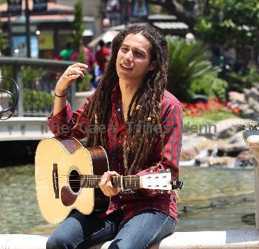 Jason Castro The former American Idol contestant performs an impromptu gig at the water fountain at The Grove, where he played two songs before continuing on his way Los Angeles.