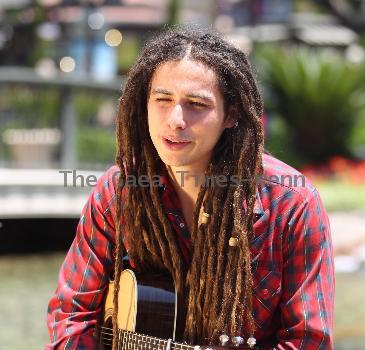 Jason Castro The former American Idol contestant performs an impromptu gig at the water fountain at The Grove, where he played two songs before continuing on his way Los Angeles.