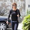 Lisa Rinnade parts a pilates studio on Melrose Avenue Los Angeles.