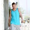 Nick Swardson actor and comedian walking down Melrose Avenue wearing a tank top Los Angeles.