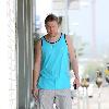 Nick Swardson actor and comedian walking down Melrose Avenue wearing a tank top Los Angeles.