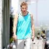 Nick Swardson actor and comedian walking down Melrose Avenue wearing a tank top Los Angeles.