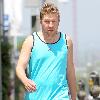 Nick Swardson actor and comedian walking down Melrose Avenue wearing a tank top Los Angeles.