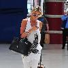 Alex Curran arriving at Liverpool Lime Street station having attended the White Tie and Tiara Ball the night before Liverpool.