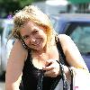 Suzanne Shaw talks on her mobile phone as she arrives at the ITV Studios Leeds.