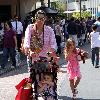 Angie Harmon takes her children shopping at The Grove Los Angeles.