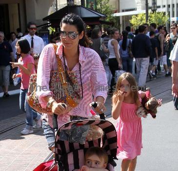 Angie Harmon takes her children shopping at The Grove Los Angeles.