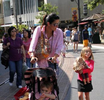 Angie Harmon takes her children shopping at The Grove Los Angeles.