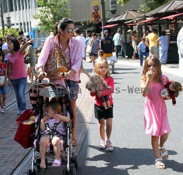 Angie Harmon takes her children shopping at The Grove Los Angeles.