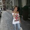 Amelle Berrabahoutside her hotel in central London wearing a Union Jack print top London.