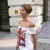 Amelle Berrabahoutside her hotel in central London wearing a Union Jack print top London.