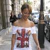 Amelle Berrabahoutside her hotel in central London wearing a Union Jack print top London.