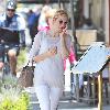 Kelly Rutherford talking on her cellphone as she arrives at Il Pastio restaurant in Beverly Hills Los Angeles.