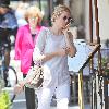 Kelly Rutherford talking on her cellphone as she arrives at Il Pastio restaurant in Beverly Hills Los Angeles.