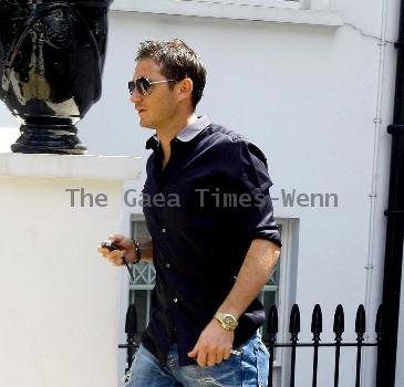 Frank Lampard 
leaves his house with girlfriend Christine Bleakley
London, England.