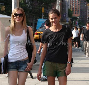 Australian supermodel, Sarah Longman seen walking through Soho with a friend. New York City.