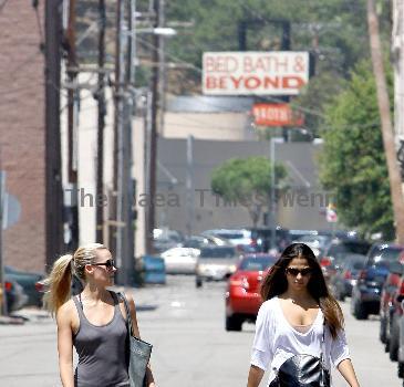 Camila Alves returning to her car with a friend after leaving a gym in Studio City Los Angeles.