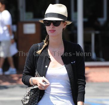 Nicky Hilton, wearing a straw fedora, seen outside Fred Segal
Los Angeles, California.