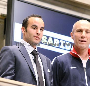 U.S. World Cup Star Landon Donovan and U.S. Men's Natonal Team Coach Bob Bradley
ring the closing bell at the New York Stock Exchange 
New York City, USA.