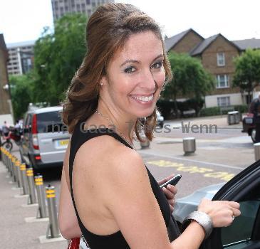 Emma Crosby outside the ITV studios wearing a summer dress London.