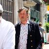 Stephen Fry
seen out walking in central London looking scruffy and unshaven. 
London, England.